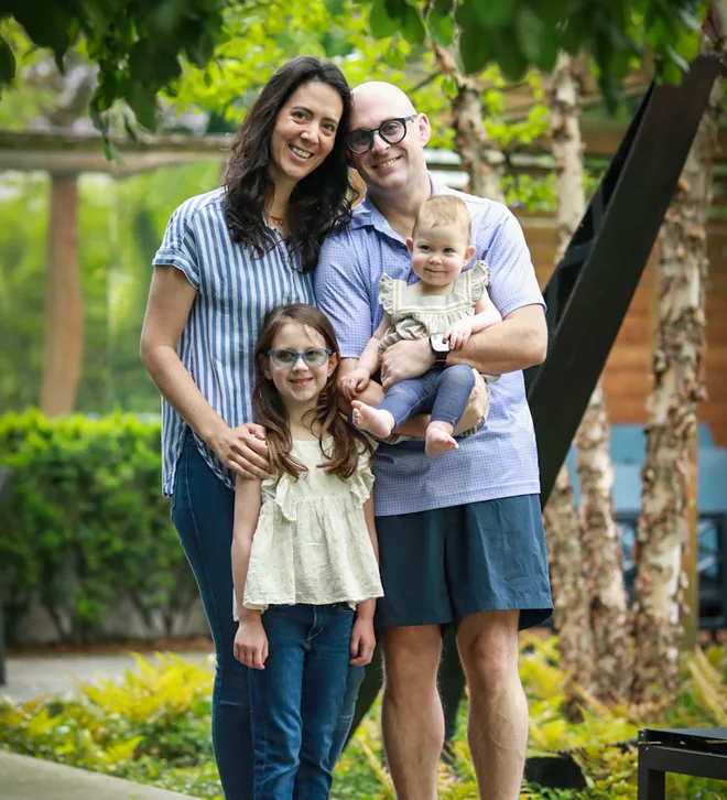 Shmuel Pressman with his wife and two daughters